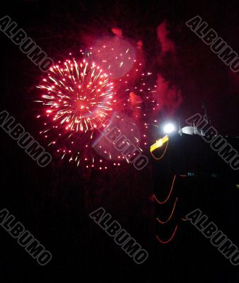 Night celebration fireworks upon dark sky