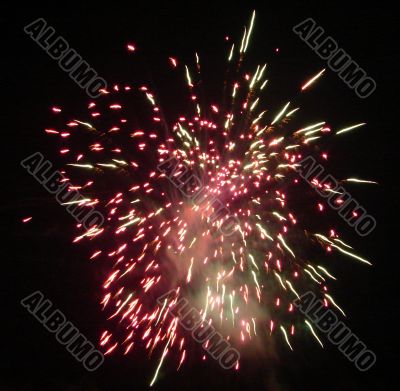 Night celebration fireworks upon dark sky