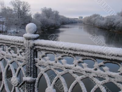 Spring snowy morning riverside