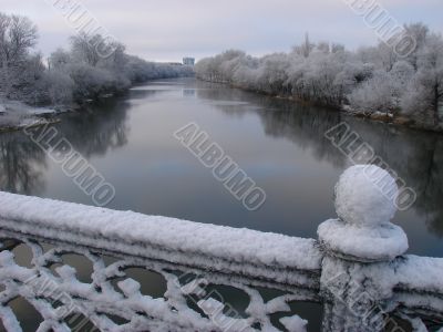 Spring snowy morning riverside