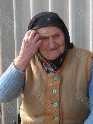 Old Ukrainian country sad granny portrait