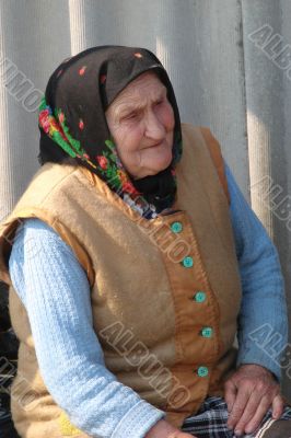 Old Ukrainian country sad granny portrait