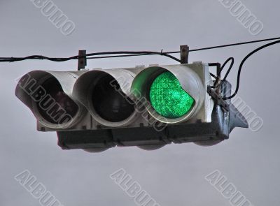 urban stoplight with green light