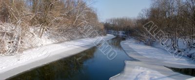 Winter snowy morning riverside