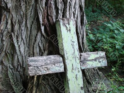 Aged broken wooden cross