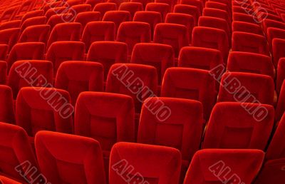 Group of many red seats in public hall
