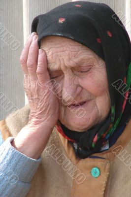 Old Ukrainian country sad granny portrait