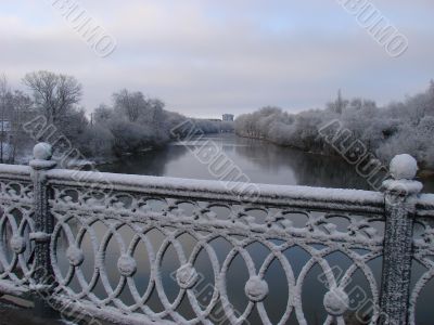 Spring snowy morning riverside