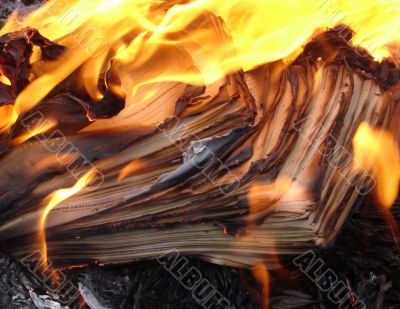 Flame of burning paper sheet stack