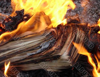 Flame of burning paper sheet stack