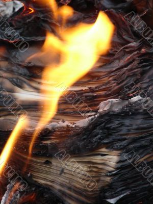 Flame of burning paper sheet stack