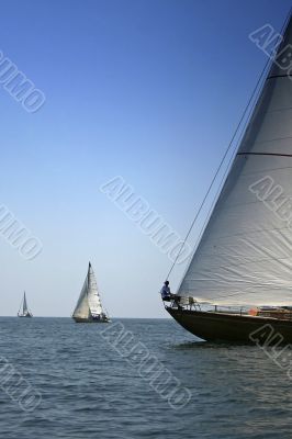 Two yachts on sea open space