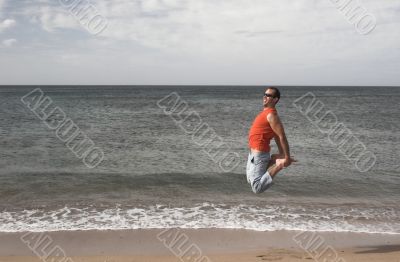 Young active man making a big jump