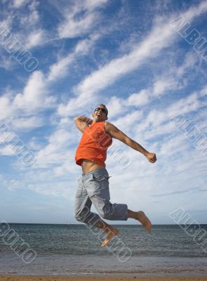 Young active man making a big jump