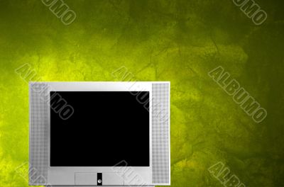Tv on a green wall