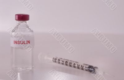 medicine vial and syringe