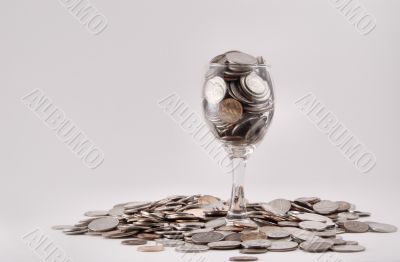 coins in a wine glass