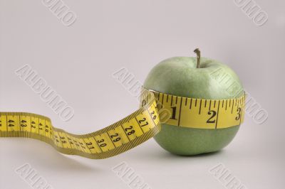 apple with tailors tape