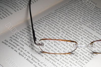 old book and glasses