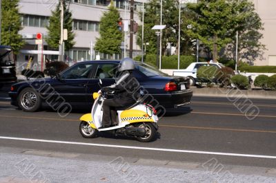 Scooter in the traffic