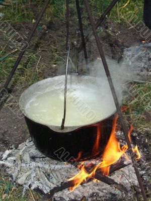 Tourist boiler upon opened wood fire