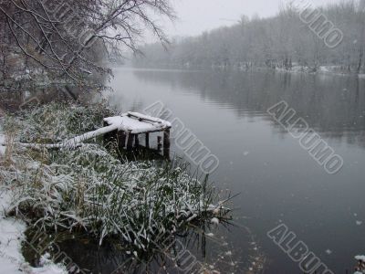 First season snowfall on river