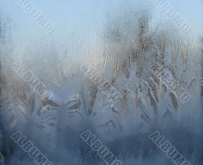 Hoarfrost on window glass in frosty weather