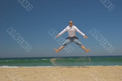 Man jumping on the beach