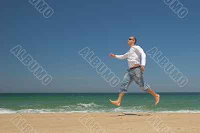 Man jumping on the beach