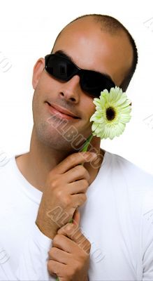 Man with a beautiful yellow flower