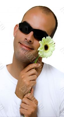 Man with a beautiful yellow flower