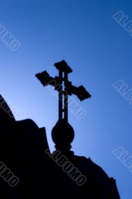 cross under the blue sky