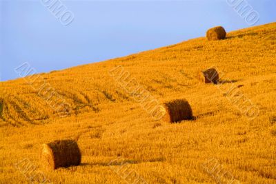 four hay balls