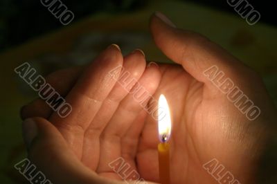 candle in hands