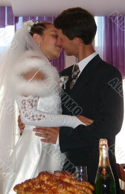 Wedding Kiss of Young Just Married Couple