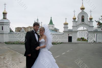 Young Wedding Couple with Holy Icons