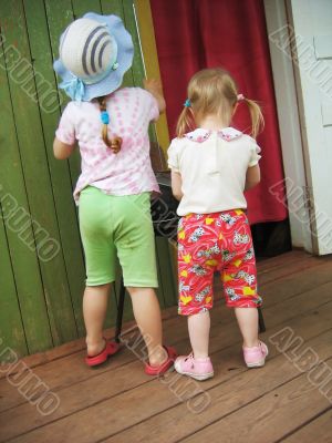 Two little girls from the back