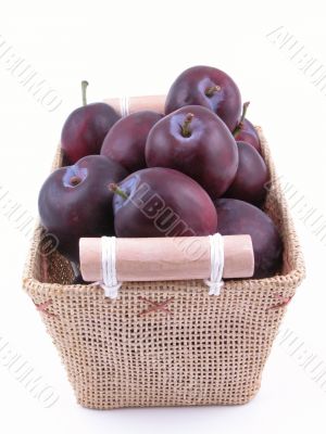 basket full of fresh plums