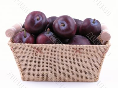 basket full of fresh plums