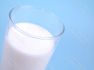 milk on blue background
