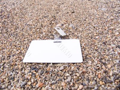 Badge on a beach