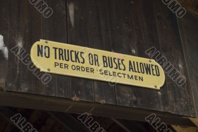 Sign on covered bridge