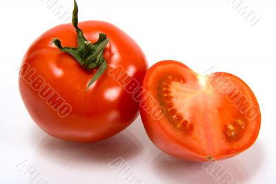 Red tomatoes on a white background