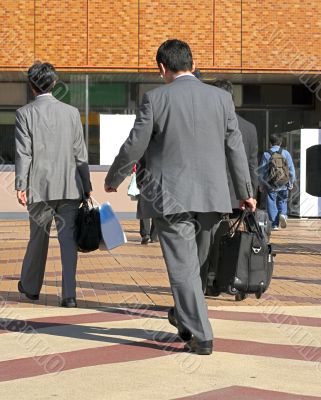 Businessmen travelling