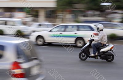 Scooter in traffic