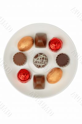 Chocolates on a white plate Chocolates on a white plate