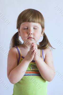 Praying little girl