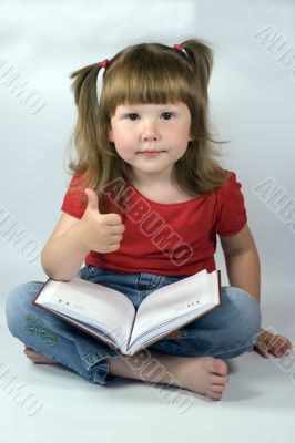 little girl answering `OK`