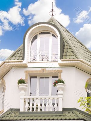 Cottage with a balcony