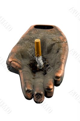 Ashtray with one cigarette on a white background